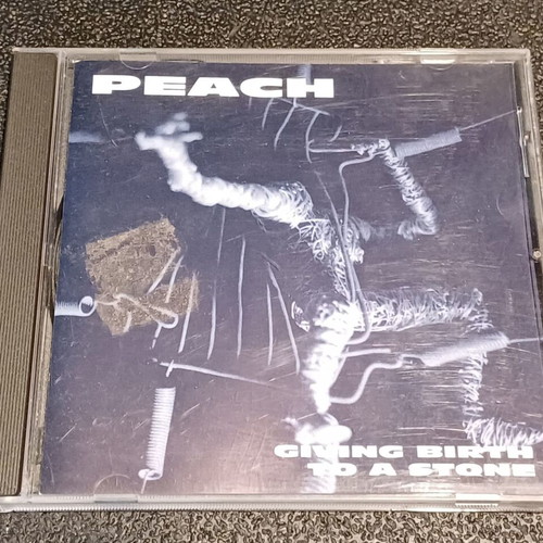 Peach Giving Birth To A Stone CD used, progressive metal