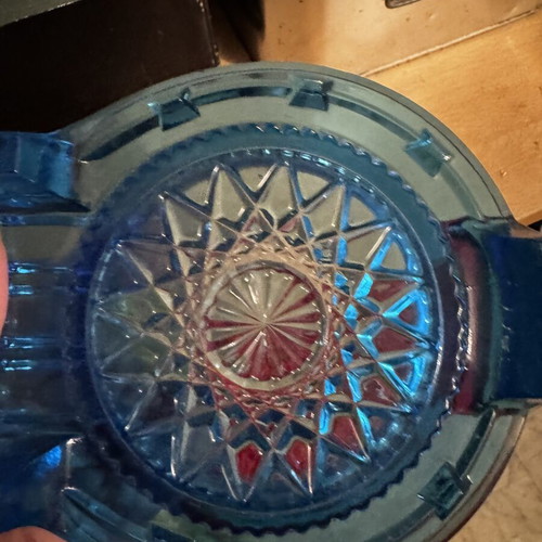 Blue glass decorative ashtray like new, carved glass