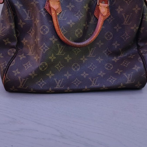 Louis Vuitton Speedy 30 handbag used, brown, zipper replaced, slight discoloration