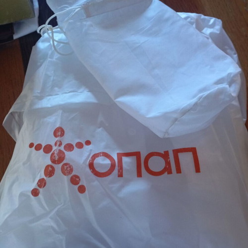 OPAP collectible set new with t-shirt, raincoat, CD case and lighters