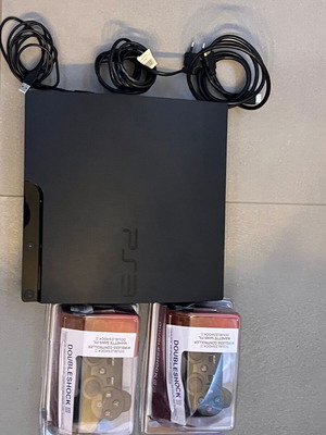 PlayStation 3 Slim 320GB console like new with 2 OEM controllers