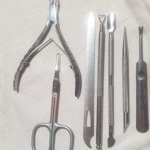 Professional manicure and pedicure set with nail lamp and tools