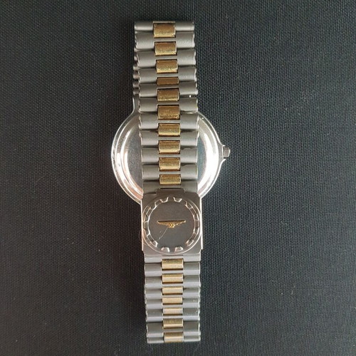 Longines Conquest V.H.P quartz used, gold and silver