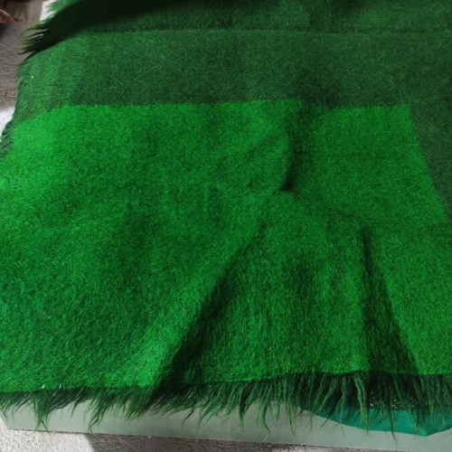 Wool flokati rug like new, dark green with discoloration