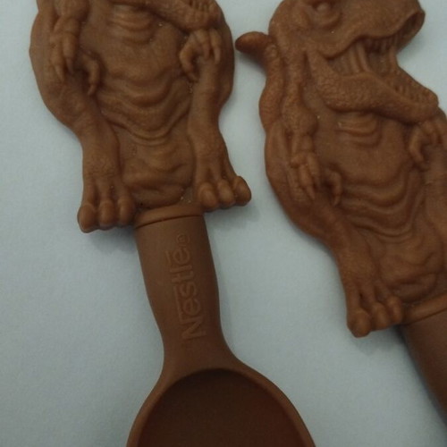 Nestle collectible spoons with Tyrannosaurus Rex, like new, set of 3