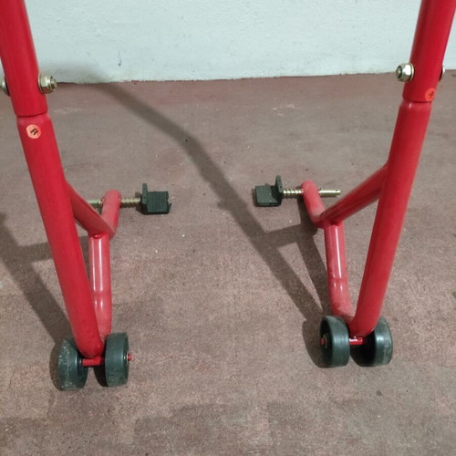Motorcycle rear stand new with four wheels