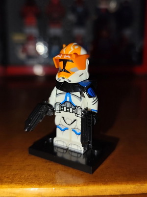 Captain Vaughn Lego minifigure with blasters and shoulder pads