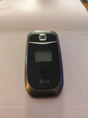 LG KP202 used, no charger, unknown functionality