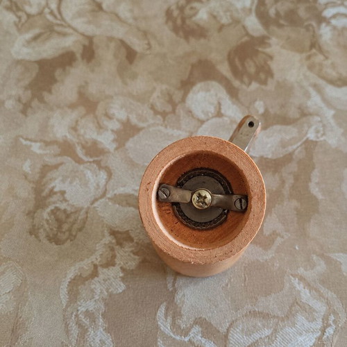 Vintage wooden spice mill used, functional