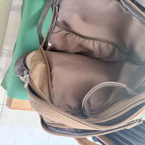 Backpack with reinforced durability, 16" capacity, multiple compartments