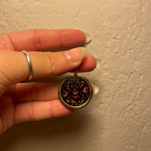 Oxette charm like new, black and gold