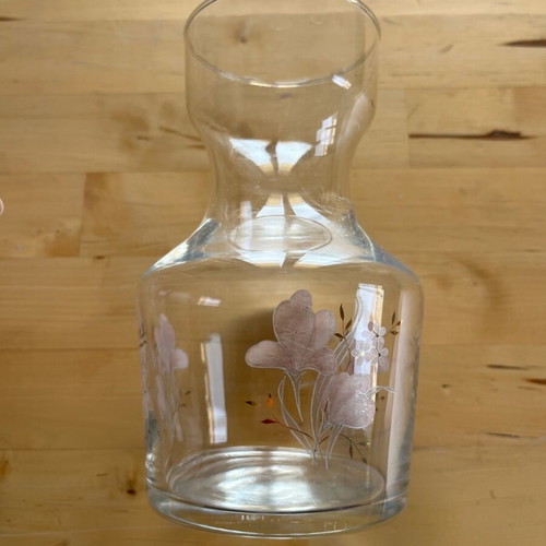 Glass bulb vase used with botanical detail