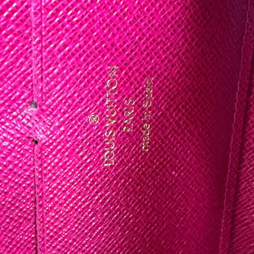 Louis Vuitton Clémence wallet used, monogram canvas with pink zipper