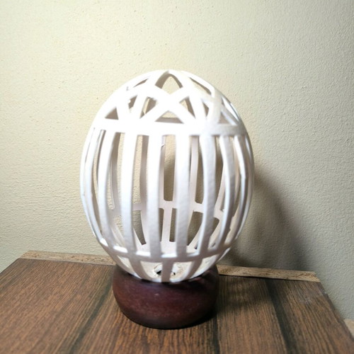 Carved decorative eggshell used from ostrich-camel egg