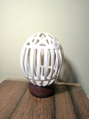 Carved decorative eggshell used from ostrich-camel egg