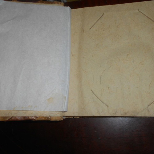 Photo album used made of recycled paper and wood, eco-friendly