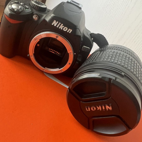 Nikon D60 camera kit used with 18-105mm VR lens, 2 batteries, cards, bag
