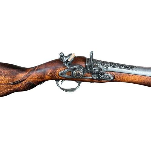 Decorative blunderbuss flintlock pistol used with wooden stock