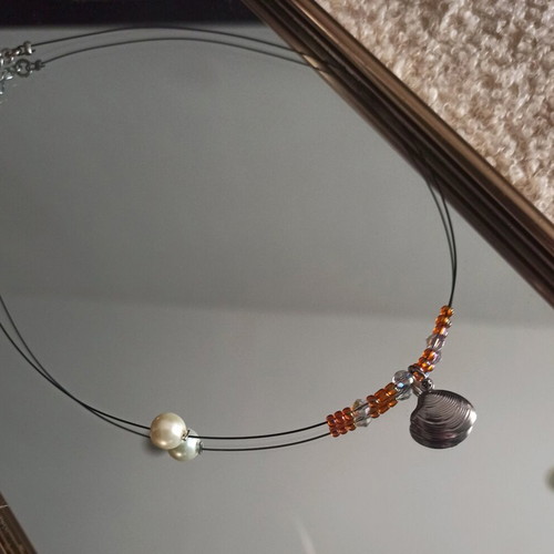 Summer necklace like new with steel elements
