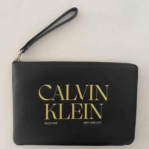 Calvin Klein graphic wristlet pouch, black and yellow
