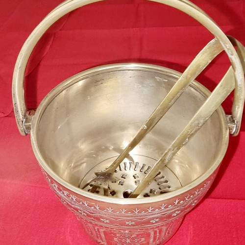 Silver-plated ice bucket like new with carved details and special handle