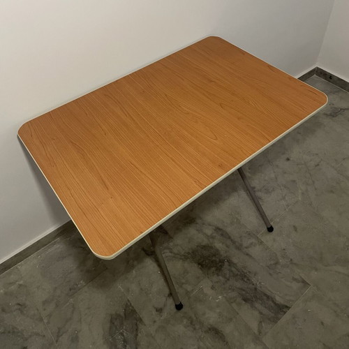 Folding table used with metal base and brown melamine top