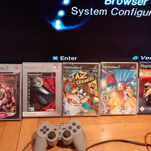 PlayStation 2 (PS2) used with 5 games pack and controller