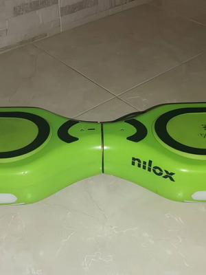 Nilox DOC 2+ hoverboard used with speaker and bluetooth