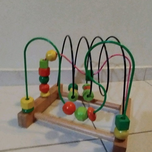 Wooden educational toy like new with wooden base