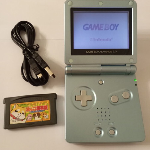Gameboy Advance SP console with Inukko Club game and USB charger