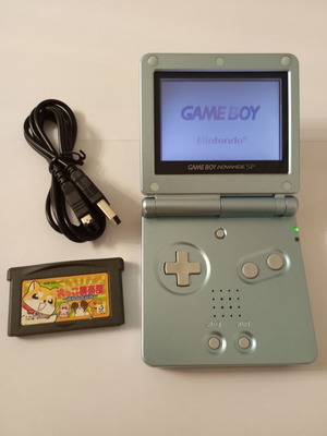 Gameboy Advance SP console with Inukko Club game and USB charger