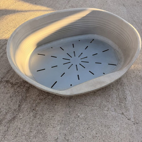 Large plastic dog bed used, outdoor weatherproof