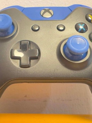 Xbox One wireless controller used with blue buttons