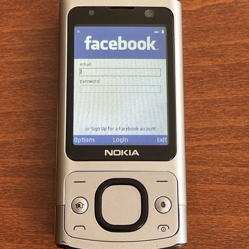 Nokia 6700s phone used with metal body and original battery