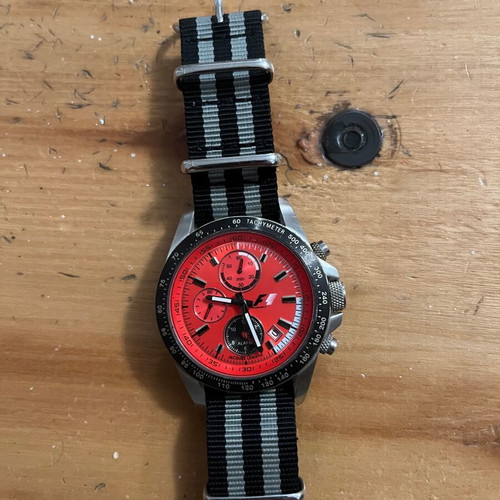 Jacques Lemans F1 watch with red dial
