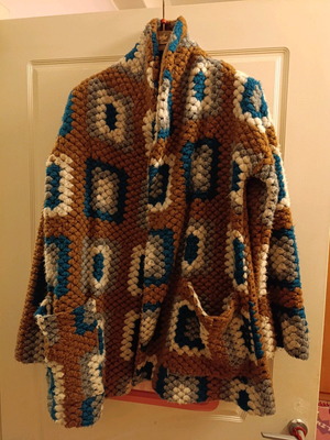 Nidodileda cardigan like new, white and brown