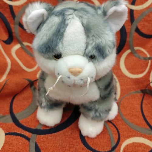 Plush cat like new, 30 cm height and length