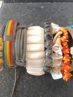Jewelry set with 9 bracelets, 5 necklaces, 4 rings, earrings and pendant
