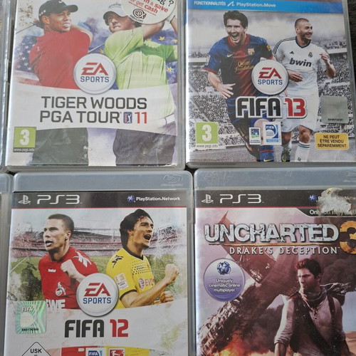 PlayStation 3 games pack with 7 titles and transparent controller like new