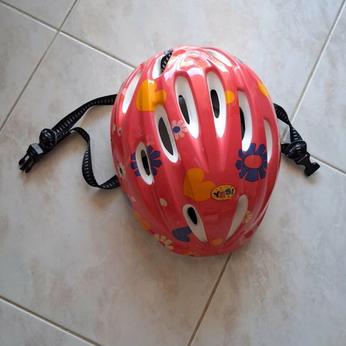 Pink adjustable children's helmet