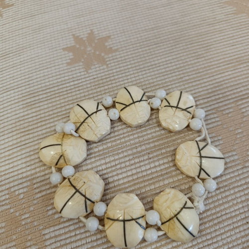 Vintage carved calf bone bracelet, 1970s