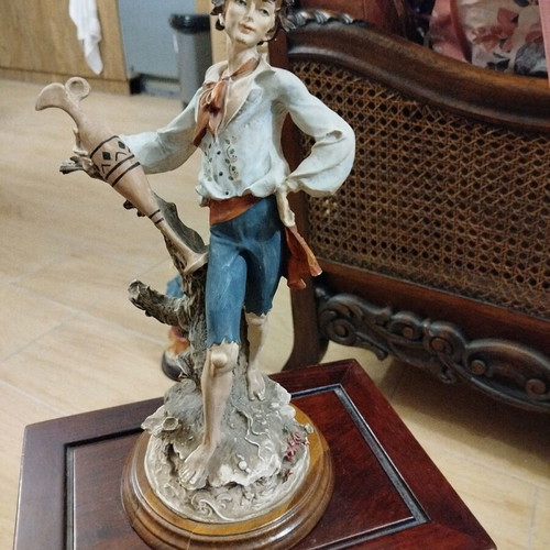 Boy statue with wooden base like new, height 35cm