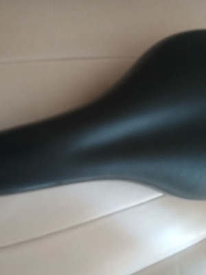 Carrera bicycle saddle like new with integrated rail clamp black