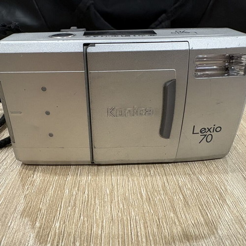 Konica Lexio 70 35mm film camera used with zoom lens