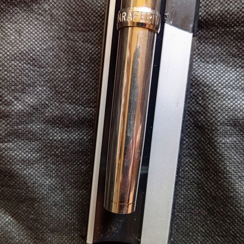 Parafernalia pen used, metal chrome finish, 1980s design