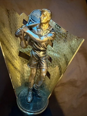 Award trophy used with tennis player figure for padel tournaments