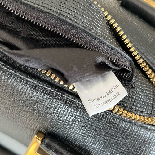 MCM black handbag with gold metal like new