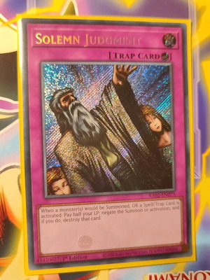 Solemn Judgement Yu-Gi-Oh! card like new with Ultra Pro sleeve
