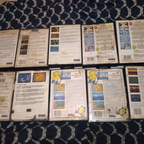 Master System games 9 with 10 cases, unknown condition