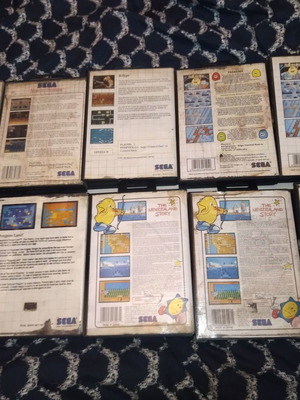 Master System games 9 with 10 cases, unknown condition